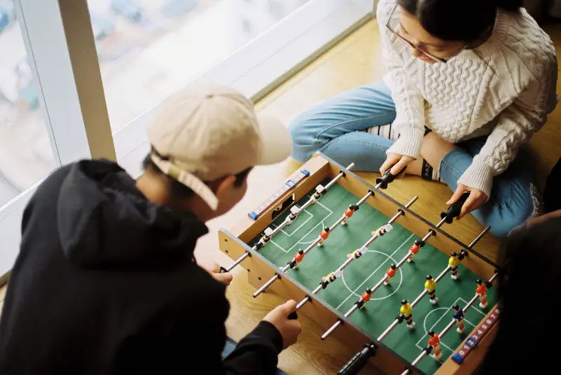 playing foosball